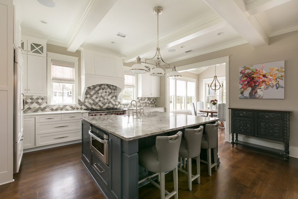 Inspiration for a coastal dark wood floor and brown floor eat-in kitchen remodel in Charleston with an island, shaker cabinets, white cabinets, multicolored backsplash, stainless steel appliances and gray countertops