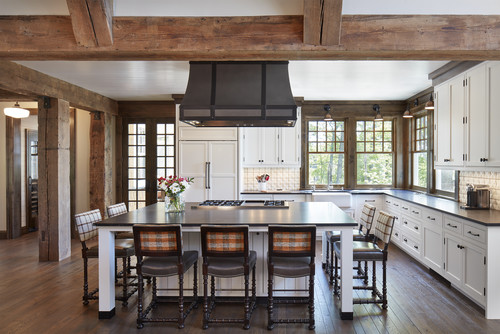 Modern shaker and flat-panel kitchen cabinets in open layout home