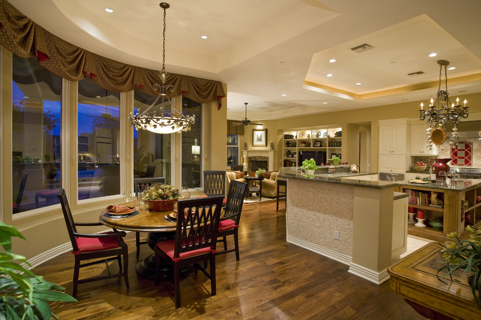 Inspiration for a mid-sized timeless u-shaped ceramic tile open concept kitchen remodel in Phoenix with a drop-in sink, raised-panel cabinets, white cabinets, granite countertops, gray backsplash, ceramic backsplash, stainless steel appliances and an island