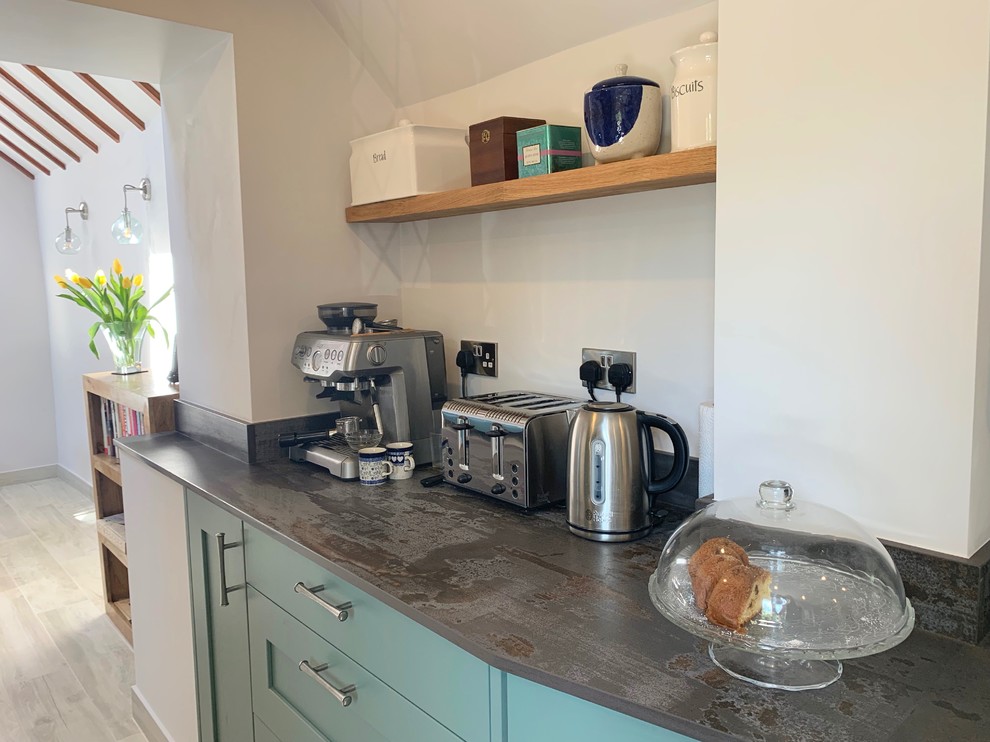 This is an example of a medium sized rural galley kitchen in Buckinghamshire.