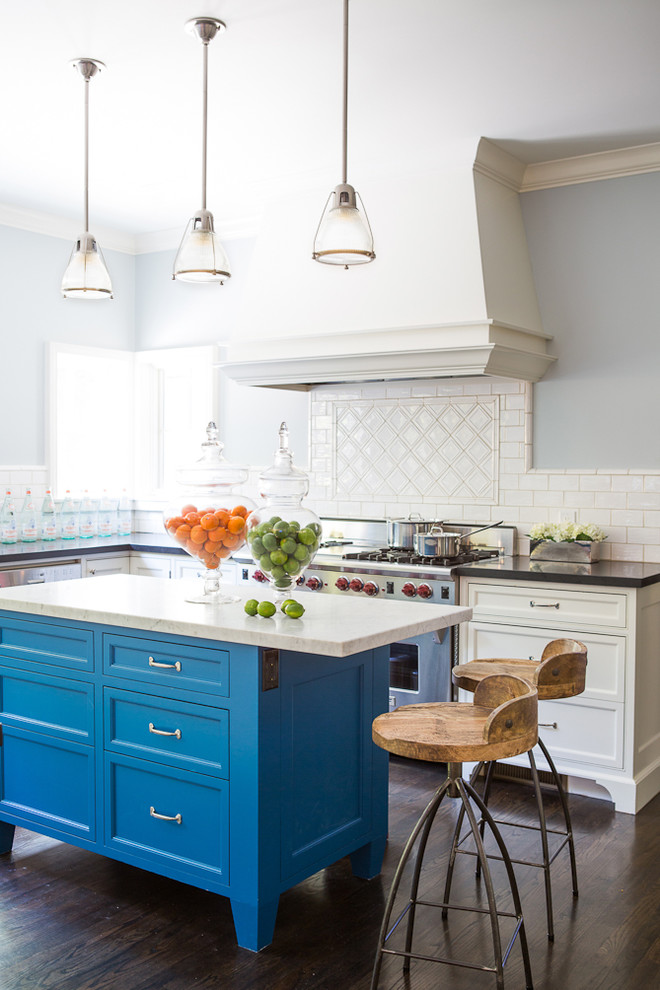 Inspiration for a coastal kitchen remodel in Los Angeles with recessed-panel cabinets, blue cabinets, white backsplash, subway tile backsplash and stainless steel appliances