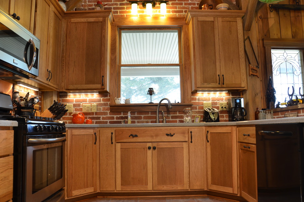 Inspiration for a medium sized farmhouse u-shaped kitchen pantry in Indianapolis with a submerged sink, shaker cabinets, brown cabinets, composite countertops, red splashback, terracotta splashback, stainless steel appliances, ceramic flooring and a breakfast bar.