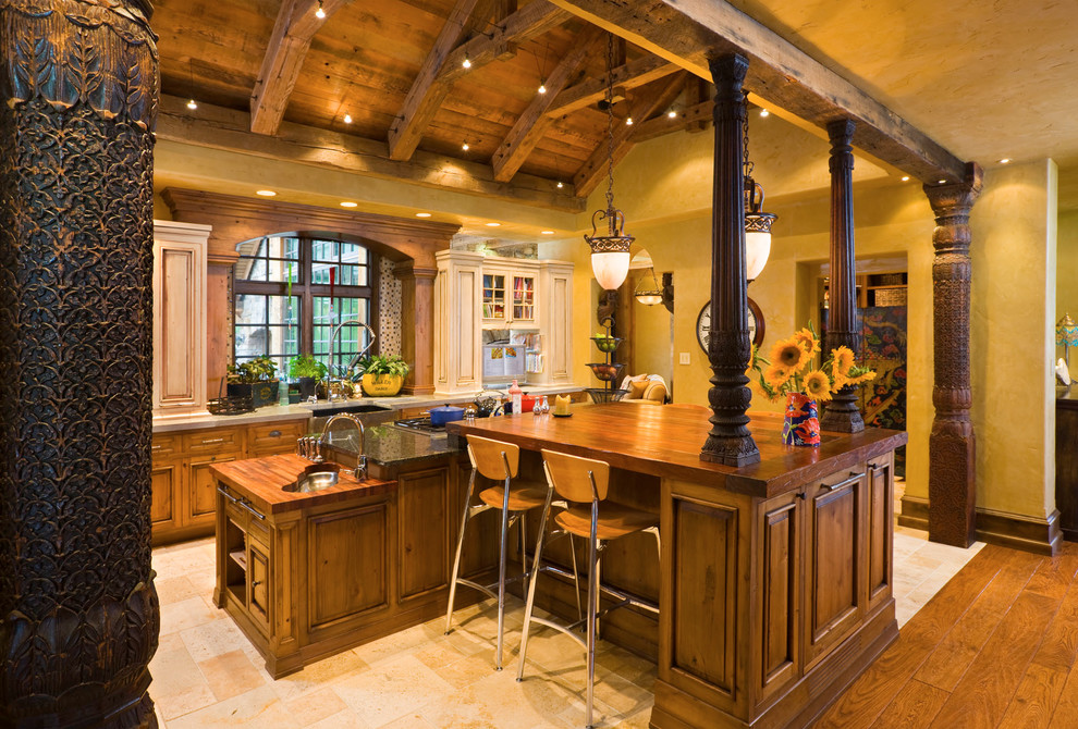 На фото: кухня в стиле рустика с фасадами с выступающей филенкой, фасадами цвета дерева среднего тона и деревянной столешницей