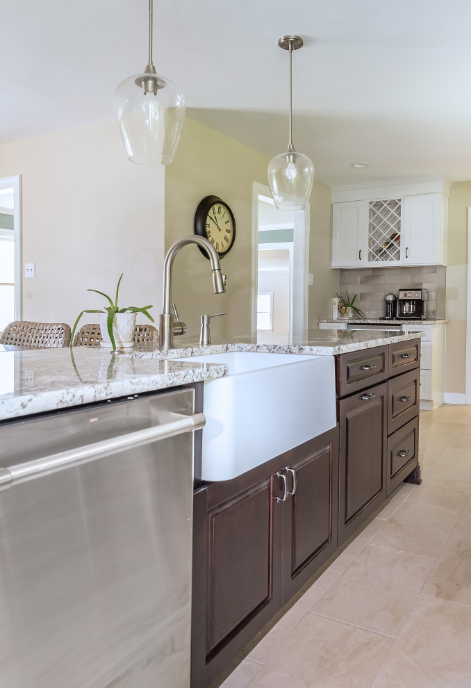 Example of a mid-sized eclectic single-wall porcelain tile and beige floor eat-in kitchen design in Philadelphia with a farmhouse sink, shaker cabinets, white cabinets, granite countertops, gray backsplash, porcelain backsplash, stainless steel appliances, an island and multicolored countertops