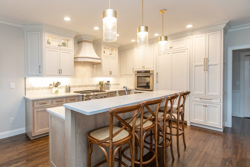 Bright studio apartment kitchen with space-saving cabinets