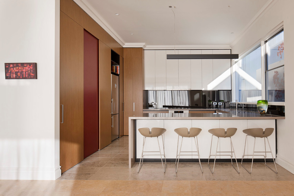 Minimalist kitchen photo in Melbourne with stainless steel appliances