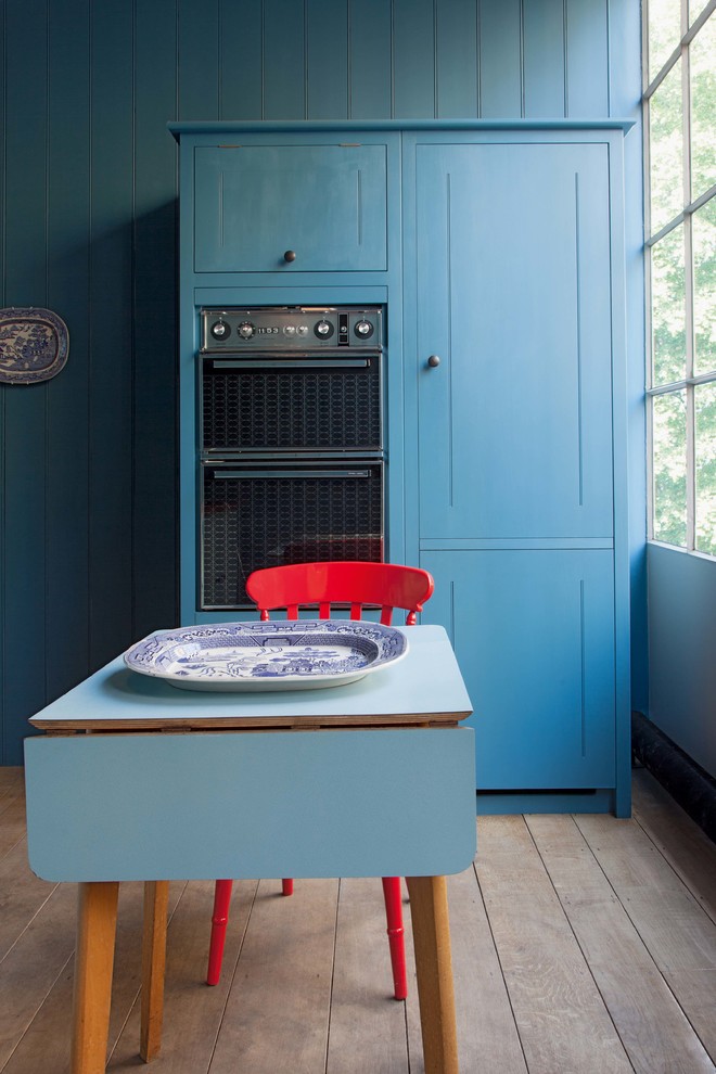 This is an example of an eclectic kitchen in London.