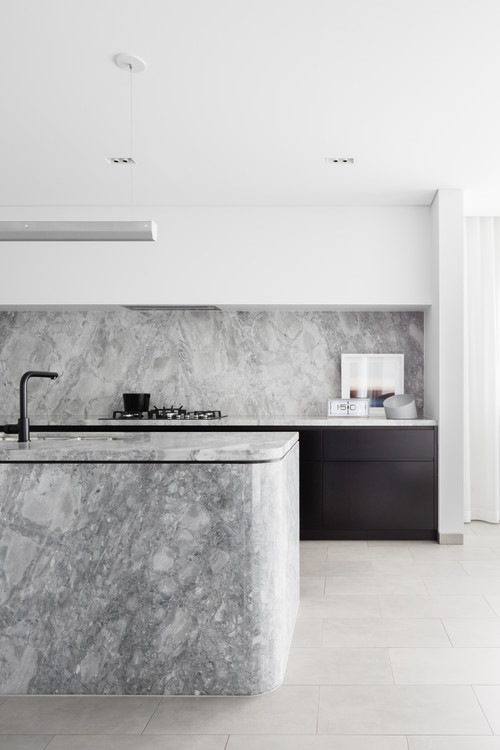 Elevate Your Design with Minimalist Kitchen Ideas: Monochrome Charm and a Stunning Marble Island