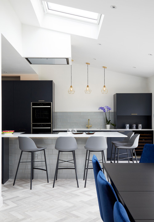 Contemporary Contrast: Black Flat Panel Cabinets Kitchen Sink Backsplash Ideas