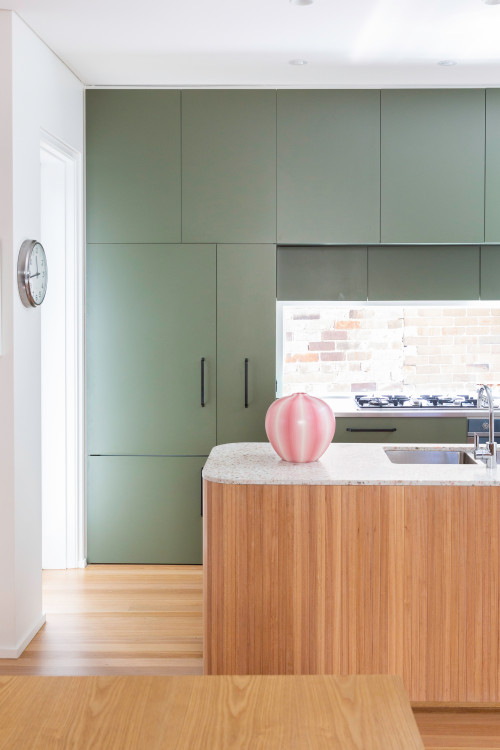 Green with Envy: Flat-Panel Cabinets, Wooden Wonders, and Window Backsplash Magic