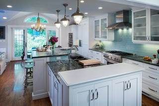 Gorgeous two story kitchen, granite countertops, pendant lighting, blue  mosaic backsplash tile, g…