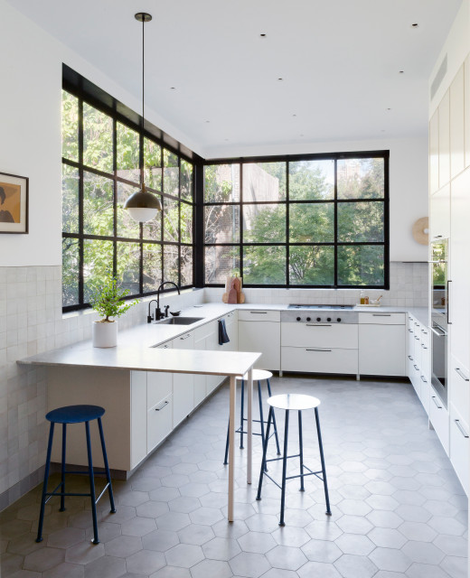 Brass And Walnut Accented Kitchen