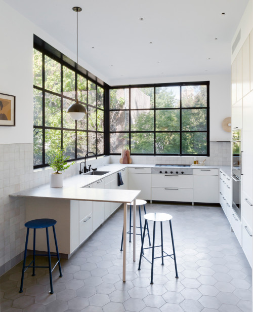 U-shaped Contemporary Beauty: White Kitchen with Hexagon Floor Tiles