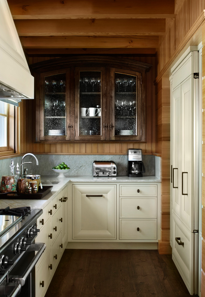 Imagen de cocina actual con armarios con paneles empotrados