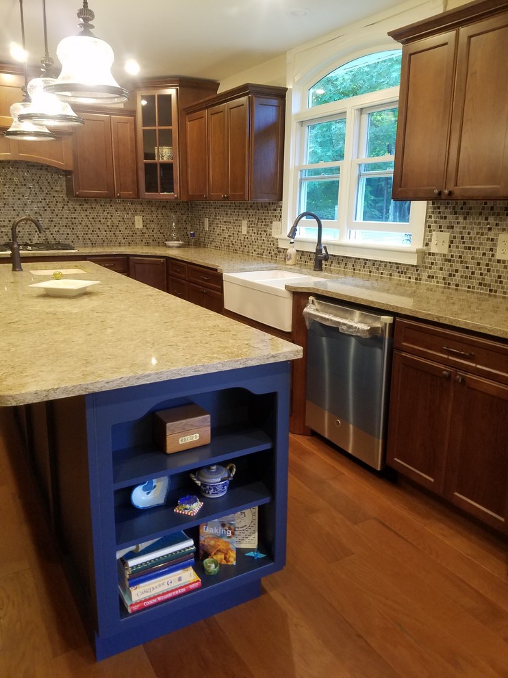Brown and Blue Kitchen by New Creation Interiors Traditional