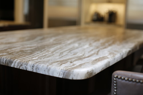 Mid-tone Fantasy Brown quartzite in this farmhouse kitchen