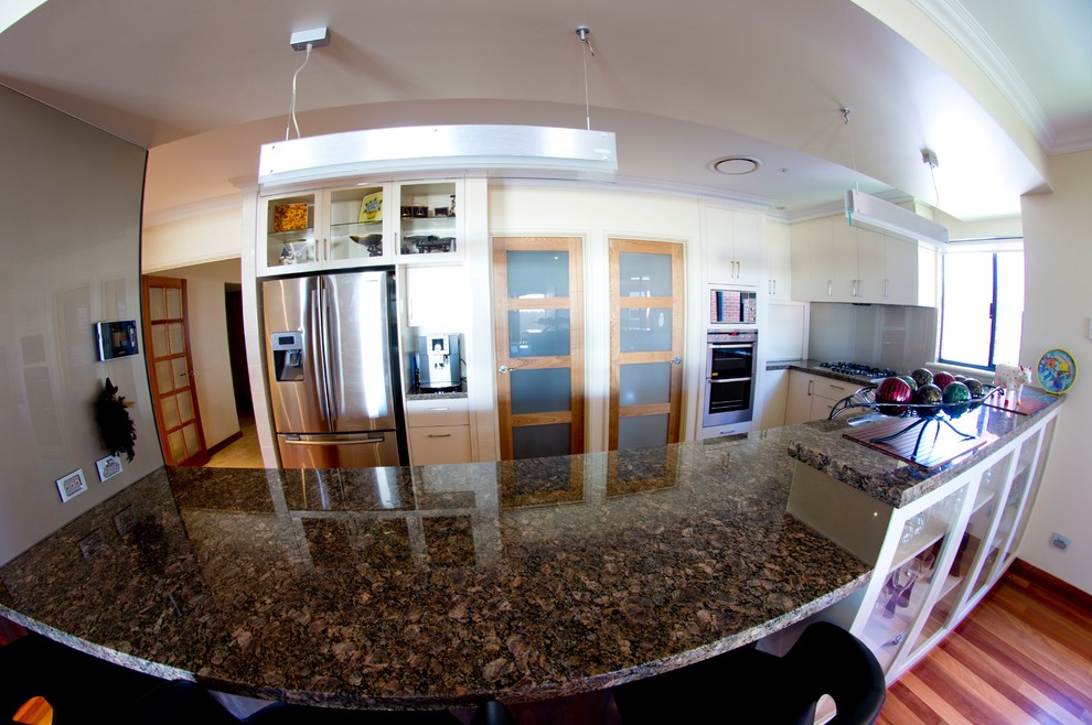Kitchen photo in Perth with granite countertops
