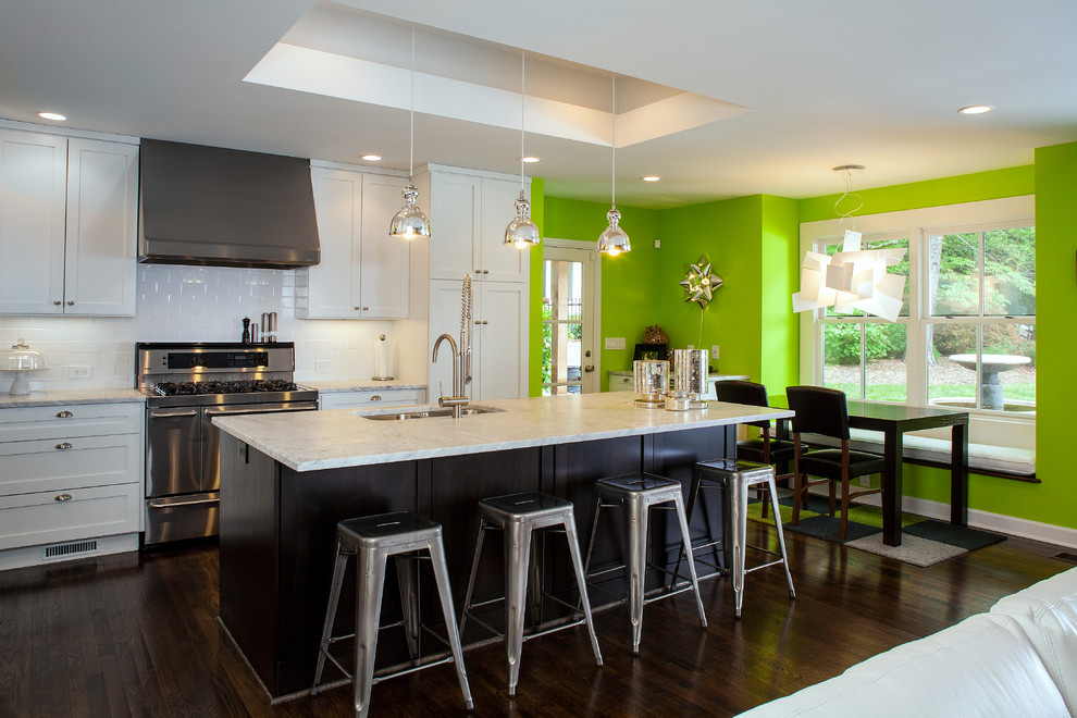 Inspiration for a contemporary eat-in kitchen remodel in Atlanta with an undermount sink, shaker cabinets, white cabinets, white backsplash and subway tile backsplash