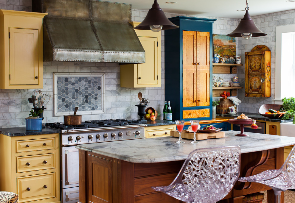 Kitchen - country l-shaped kitchen idea in Philadelphia with beaded inset cabinets, yellow cabinets and an island