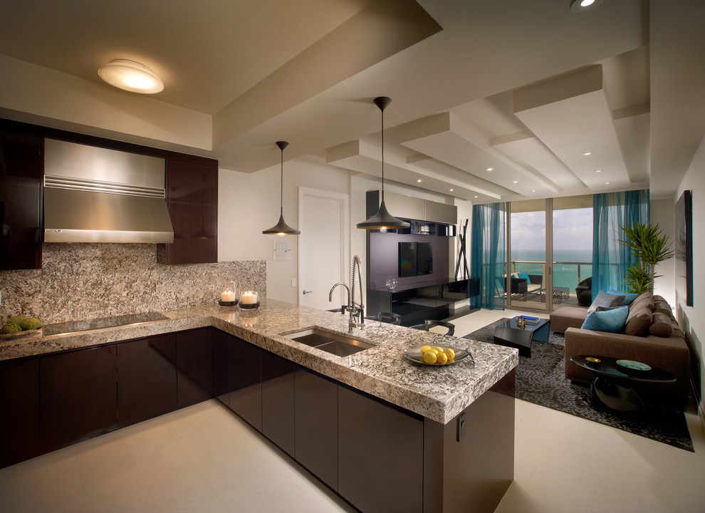 Inspiration for a medium sized contemporary l-shaped open plan kitchen in Miami with dark wood cabinets, granite worktops and stainless steel appliances.