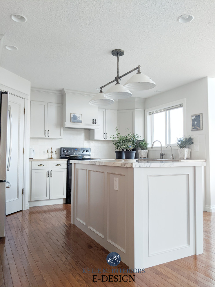 Mid-sized transitional u-shaped medium tone wood floor open concept kitchen photo with a drop-in sink, shaker cabinets, gray cabinets, laminate countertops, gray backsplash, porcelain backsplash, stainless steel appliances, an island and beige countertops