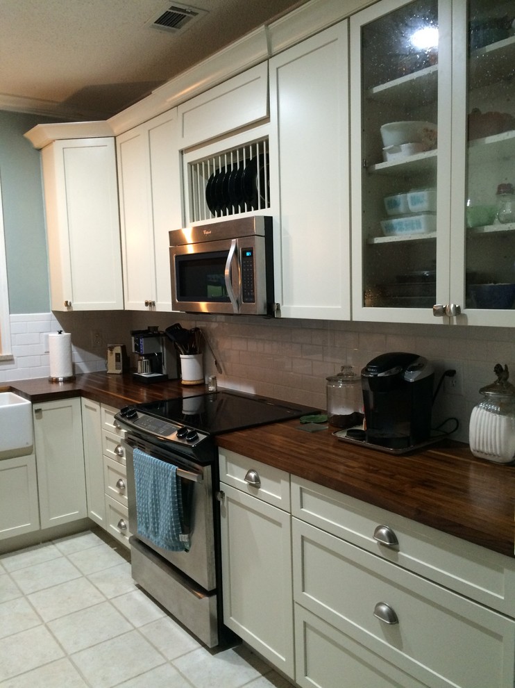 Photo of a small nautical l-shaped kitchen in Other.