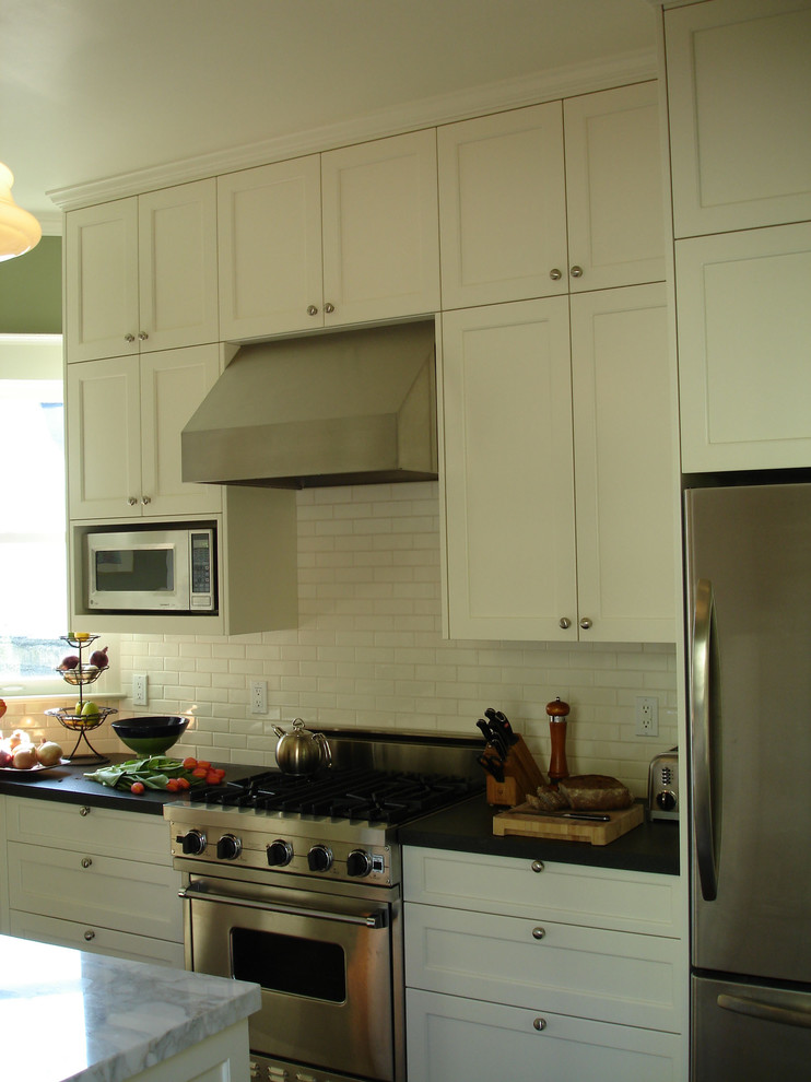 Design ideas for a classic kitchen in San Francisco with metro tiled splashback and granite worktops.