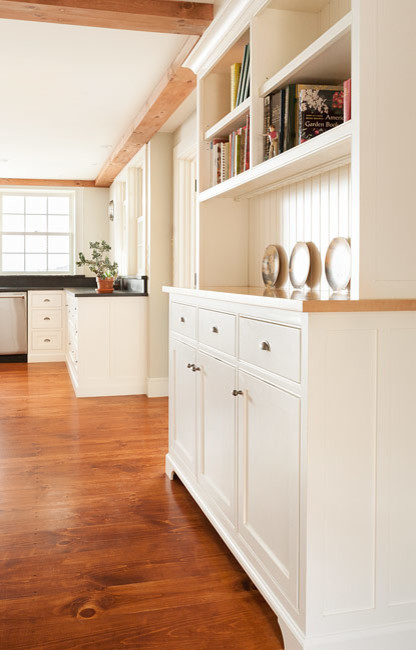 Kitchen - huge country medium tone wood floor kitchen idea in Boston with beaded inset cabinets, white cabinets, wood countertops, white backsplash and two islands