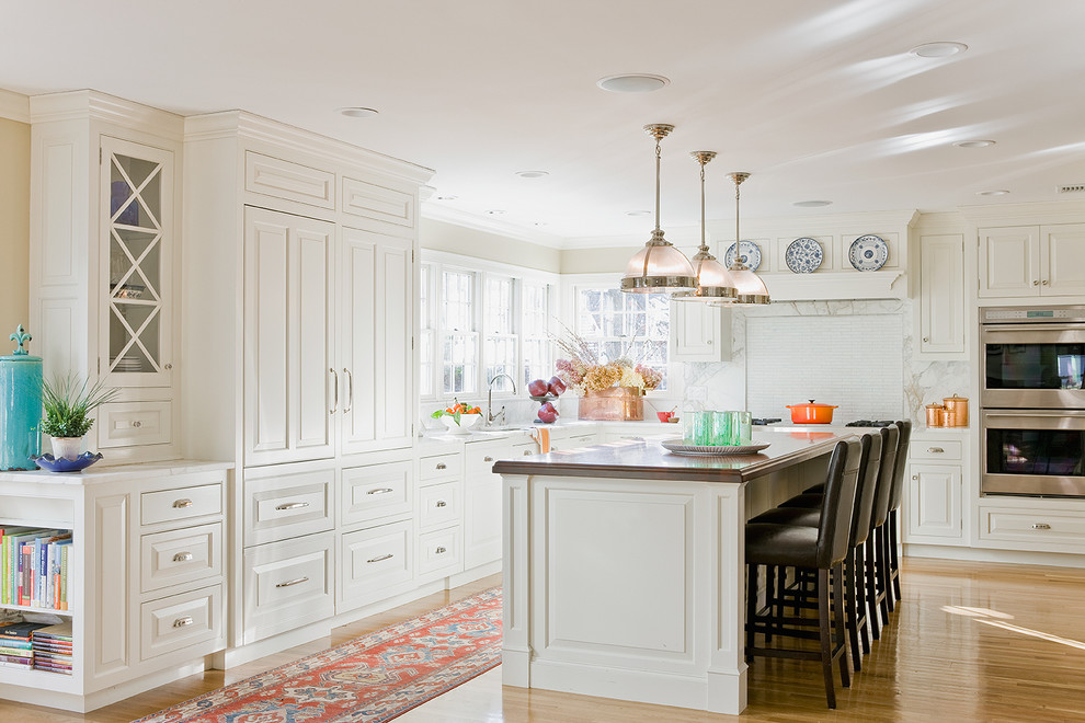 Inspiration for a timeless kitchen remodel in Boston with wood countertops
