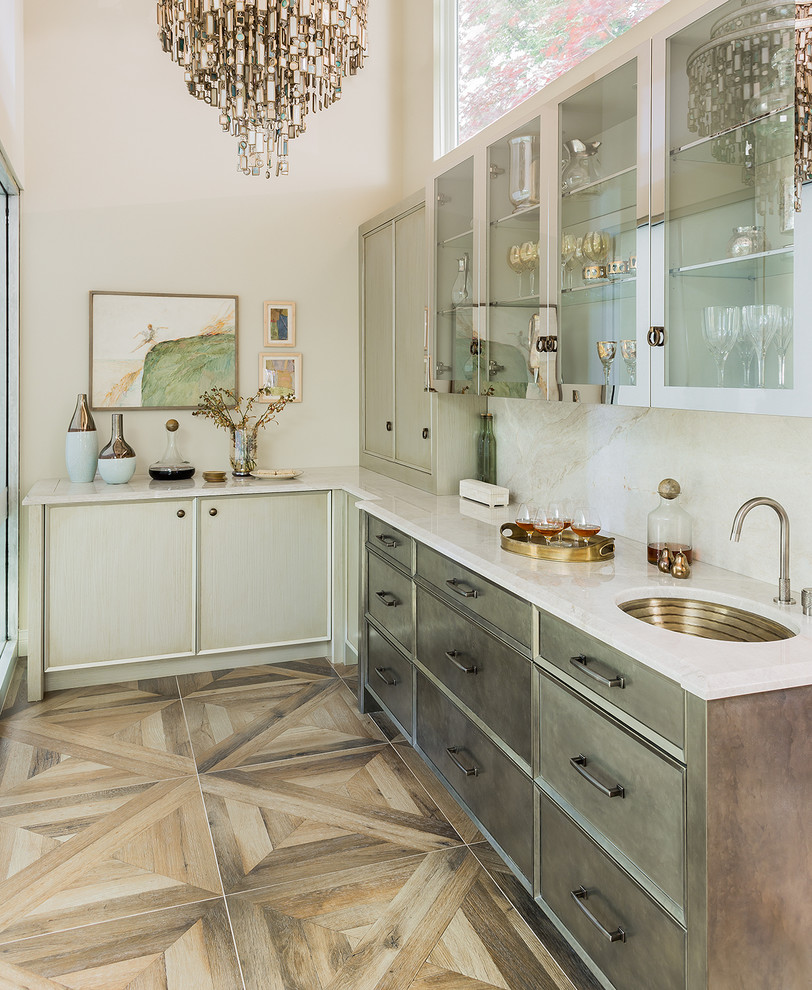 Transitional kitchen photo in Boston with glass-front cabinets