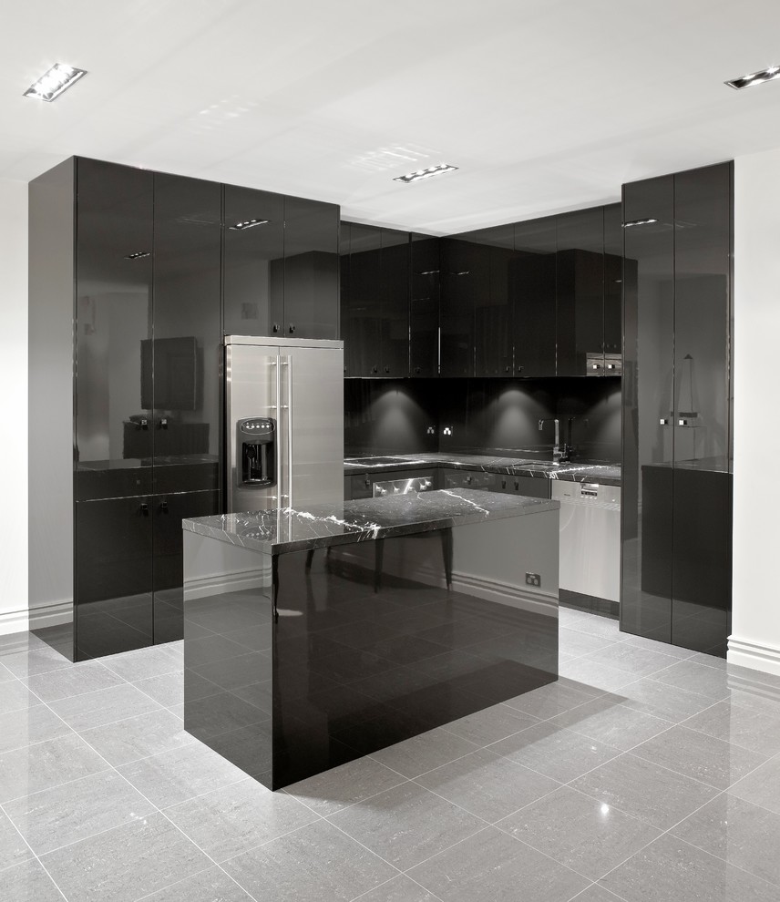 Trendy l-shaped kitchen photo in Melbourne with black cabinets, black backsplash and stainless steel appliances