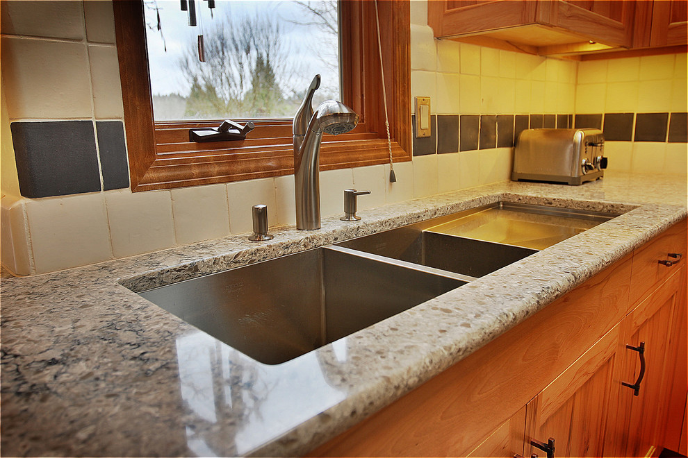 Inspiration for a large timeless u-shaped kitchen remodel in Portland with an undermount sink and a peninsula