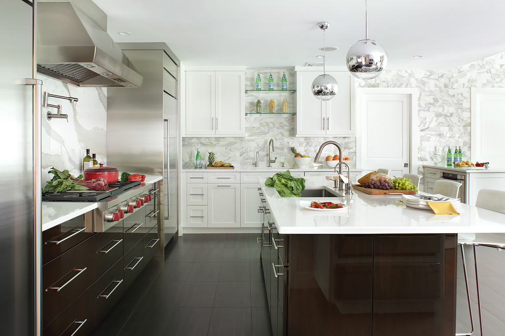 Inspiration for a mid-sized contemporary u-shaped ceramic tile eat-in kitchen remodel in New York with an undermount sink, flat-panel cabinets, dark wood cabinets, quartz countertops, white backsplash, stone slab backsplash, paneled appliances and an island