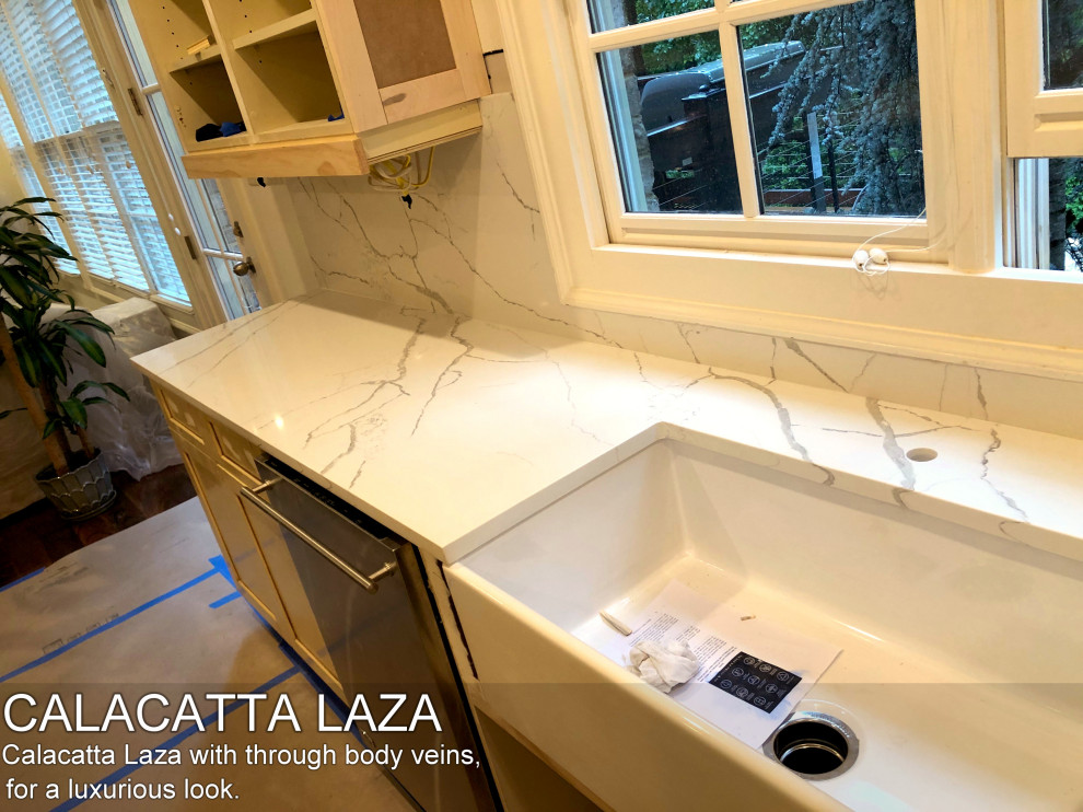 This is an example of a large modern single-wall kitchen in Atlanta with a submerged sink, open cabinets, light wood cabinets, quartz worktops, white splashback, engineered quartz splashback, stainless steel appliances, plywood flooring, multiple islands, brown floors and white worktops.