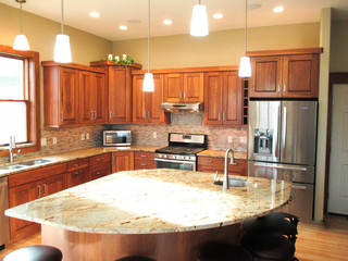 Calico Hickory cabinets w/ Brown Sugar stain and Golden Crystal granite ...