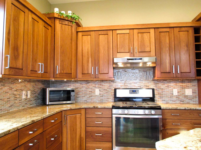 Calico Hickory cabinets with Brown Sugar stain and Golden Crystal ...