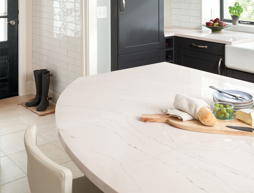 Kitchen - kitchen idea in Miami with quartz countertops