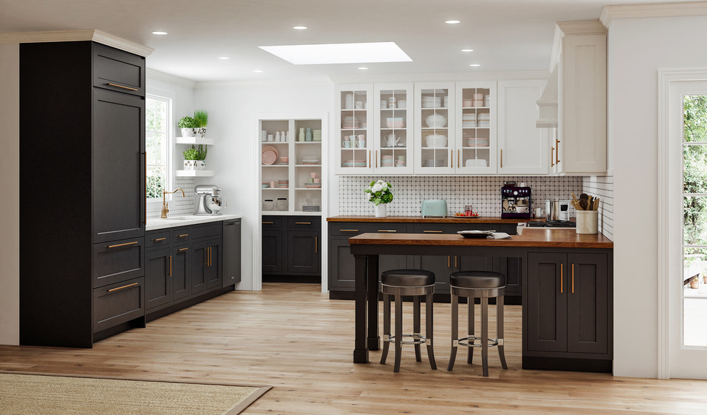 Example of a mid-sized trendy l-shaped light wood floor and beige floor open concept kitchen design in Other with an undermount sink, shaker cabinets, white cabinets, wood countertops, white backsplash, stainless steel appliances, a peninsula and brown countertops