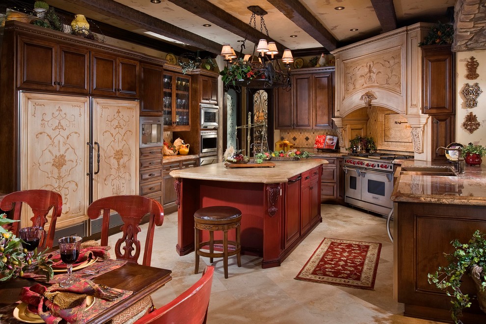 Inspiration for a mediterranean kitchen remodel in Orange County with raised-panel cabinets, dark wood cabinets and beige backsplash