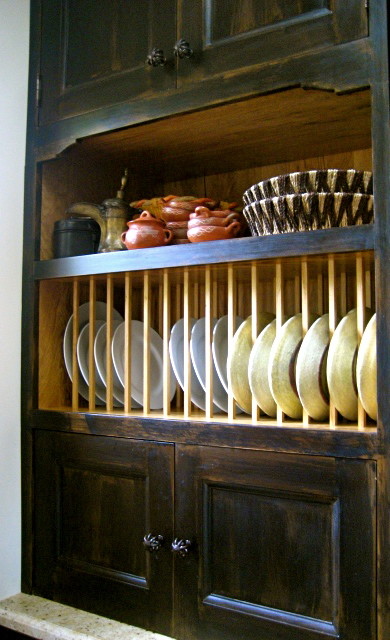 Custom, in-cabinet dish drying rack. Water drips directly into the sink. -  Transitional - Kitchen - Seattle - by Genay Bell Interior Design