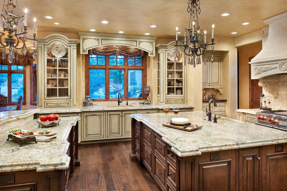 Example of a large classic galley dark wood floor and multicolored floor eat-in kitchen design in Denver with an undermount sink, beaded inset cabinets, beige cabinets, granite countertops, beige backsplash, mosaic tile backsplash, colored appliances and multicolored countertops