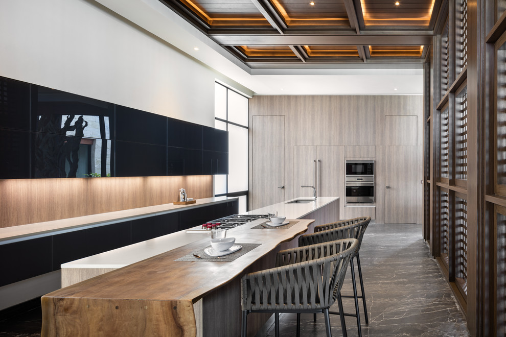 Design ideas for a contemporary kitchen in Austin with a submerged sink, flat-panel cabinets, black cabinets, window splashback, an island, grey floors, white worktops and marble flooring.