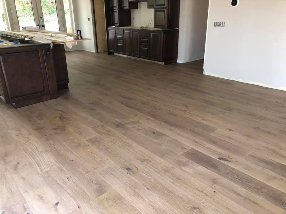 Inspiration for a large timeless l-shaped medium tone wood floor and brown floor eat-in kitchen remodel in San Diego with an island and brown countertops