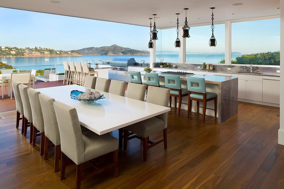 Large contemporary kitchen/diner in San Francisco with a submerged sink, flat-panel cabinets and white cabinets.