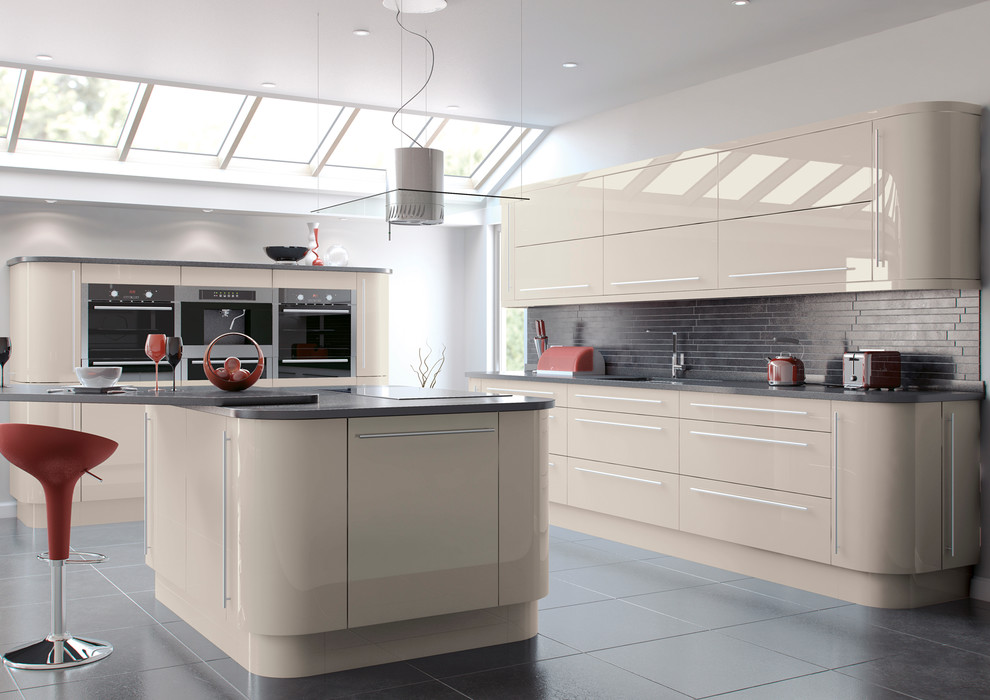 Design ideas for an expansive contemporary enclosed kitchen in West Midlands with a submerged sink, flat-panel cabinets, white cabinets, stainless steel appliances, ceramic flooring and an island.