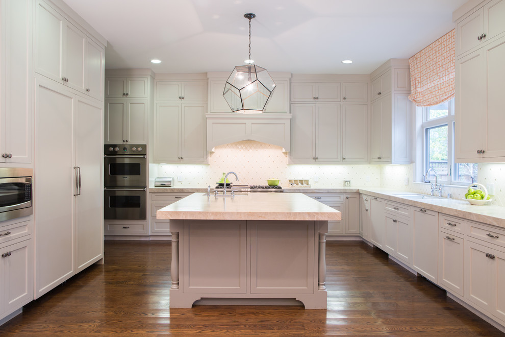 Kitchen - traditional u-shaped kitchen idea in San Francisco with an island