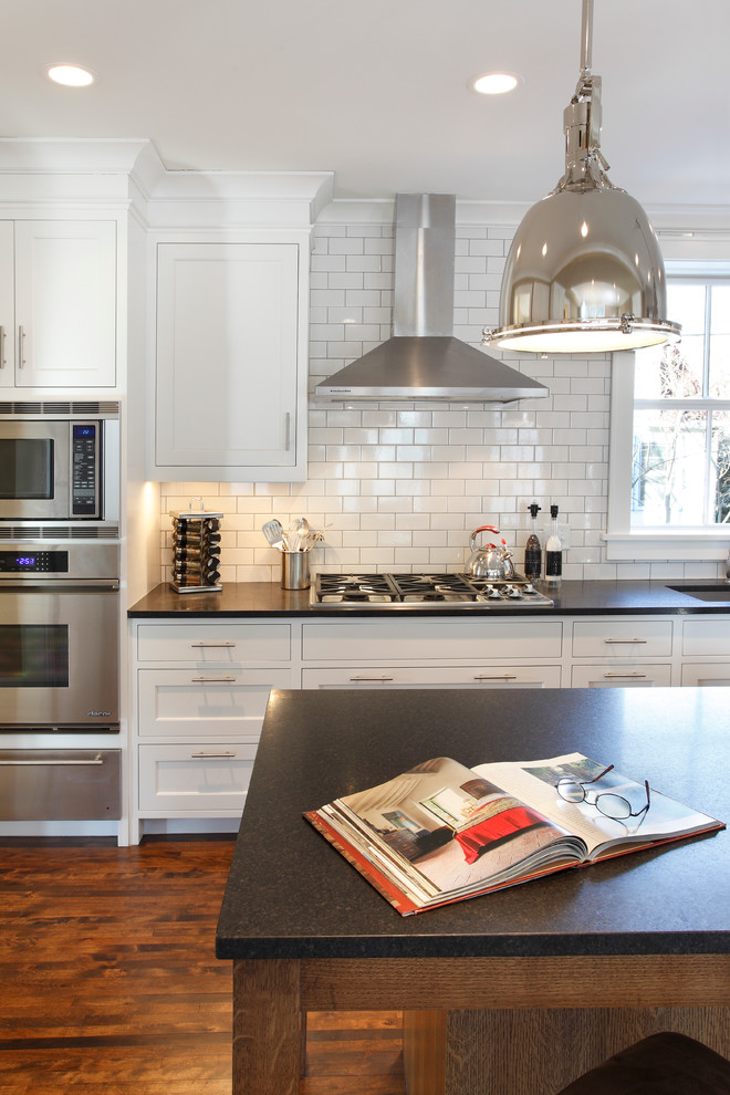 Inspiration for a contemporary kitchen remodel in Minneapolis with subway tile backsplash