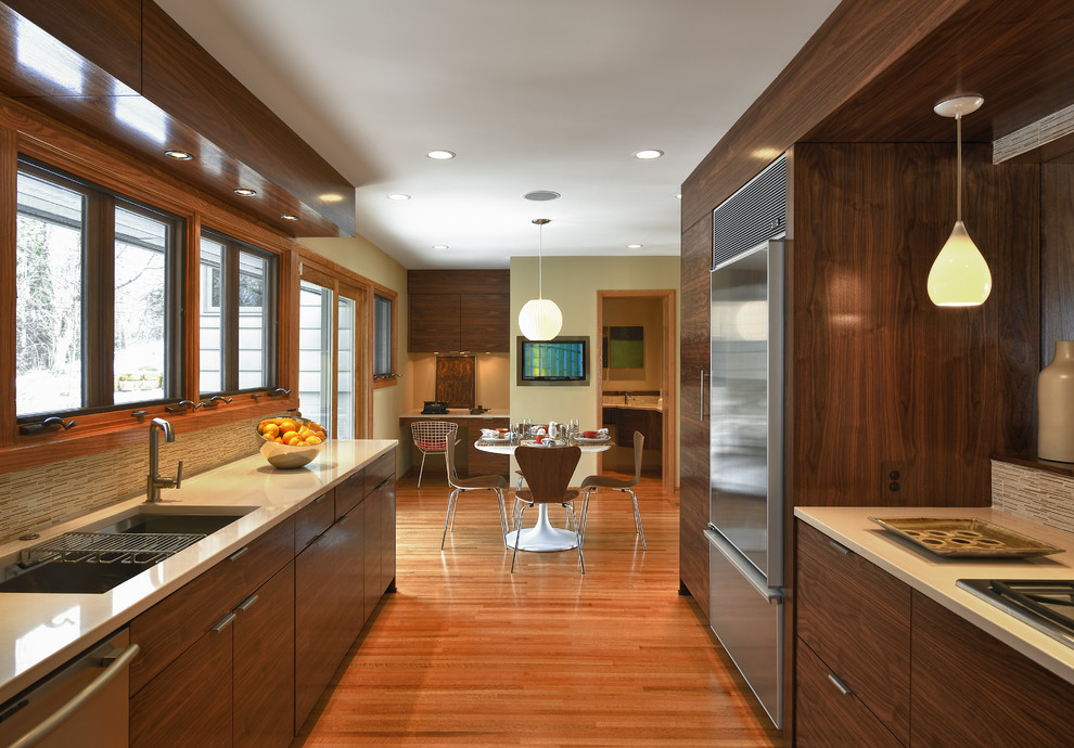 Photo of a modern galley kitchen in Minneapolis with stainless steel appliances.