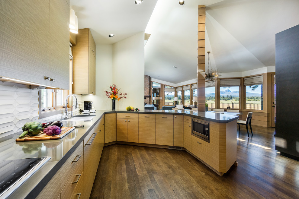 Design ideas for a large contemporary kitchen in Other with flat-panel cabinets, medium wood cabinets, engineered stone countertops, white splashback, ceramic splashback, a breakfast bar, a submerged sink and medium hardwood flooring.