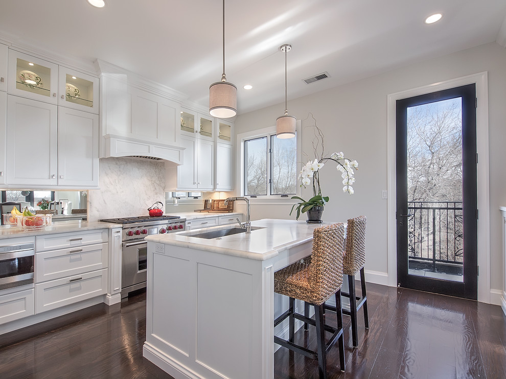 This is an example of a classic kitchen in Denver with stainless steel appliances.
